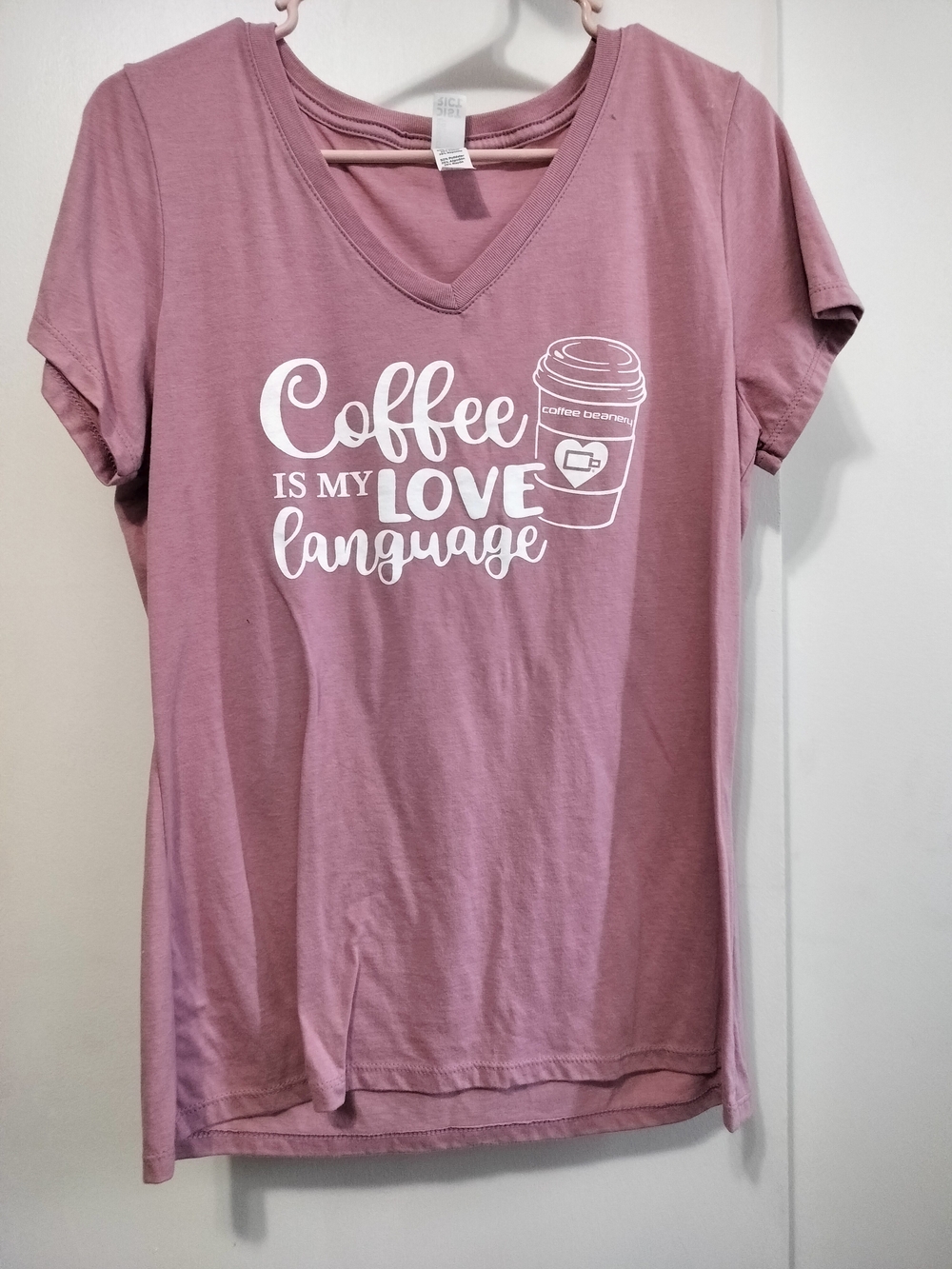 District Pink V‑Neck Tee with White 'Coffee Is My Love Language' Graphic